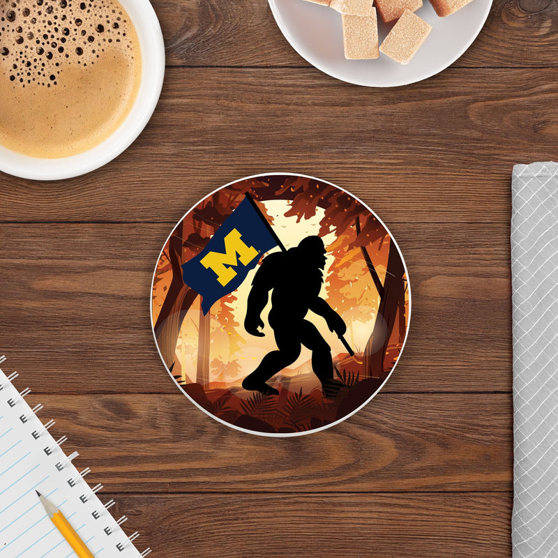 Load image into Gallery viewer, Fan Creations University of Michigan -  4 inch Ceramic Big Foot Flag Car Coaster
