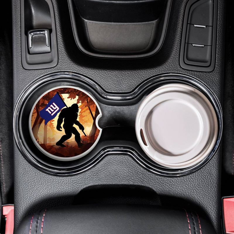 Load image into Gallery viewer, Fan Creations NFL New York Giants Themed Ceramic Car Coaster – 2.5" Bigfoot Carrying Team Flag Design - 2 Pack
